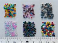 Glass beads,  diam 2 mm